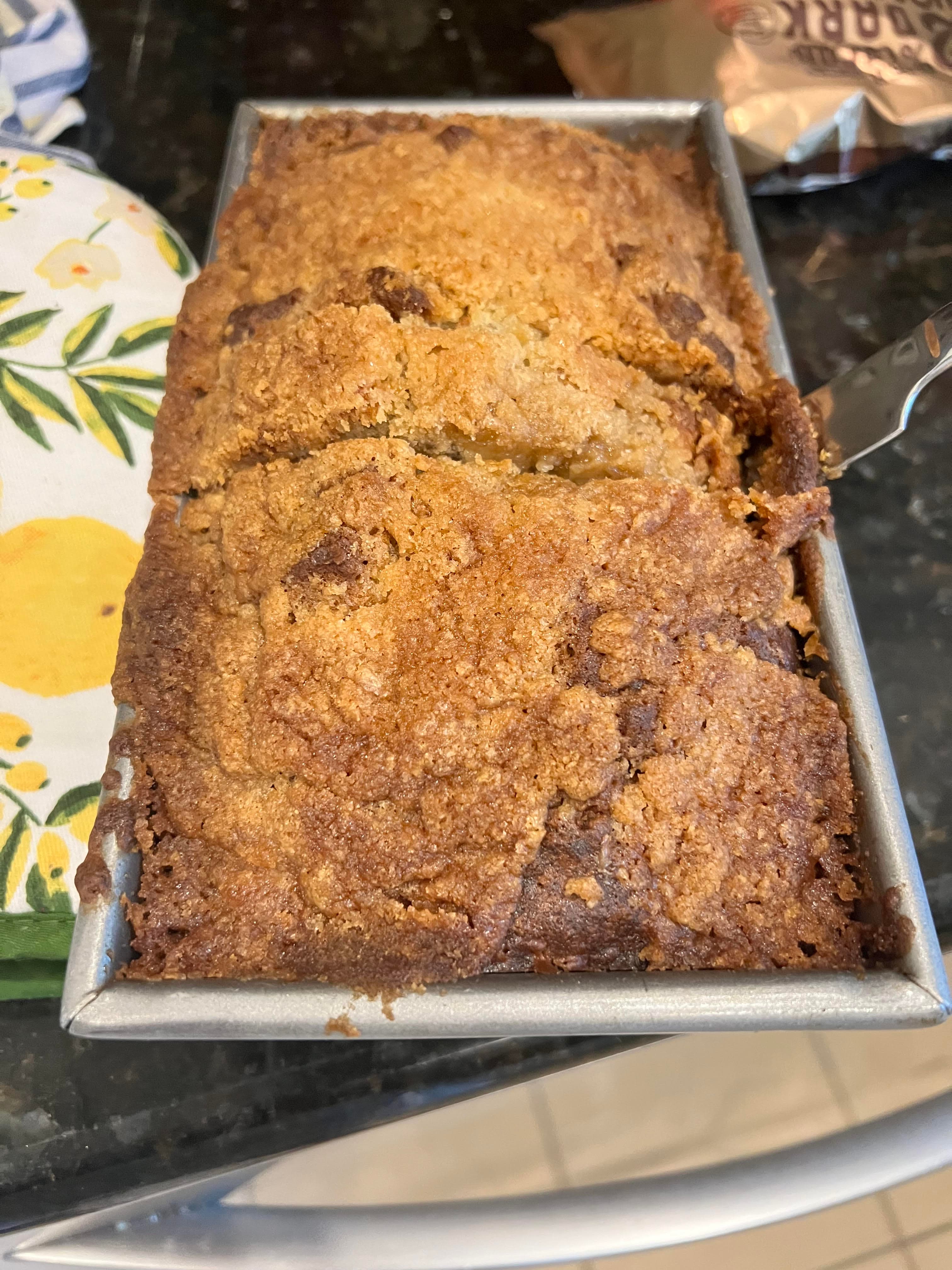 Streusel-topped pumpkin bread loaf with cinnamon crumble topping